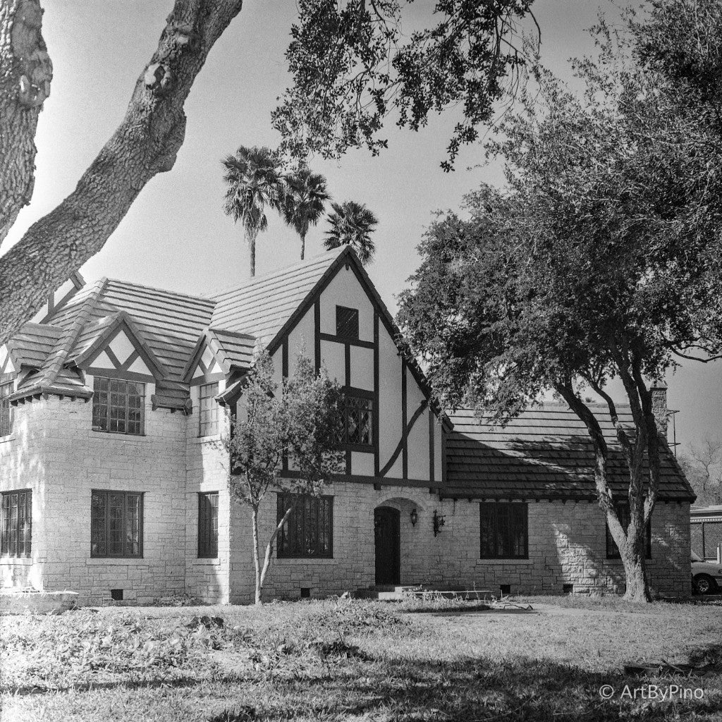 Tudor-style stone house with timbered gable and arched door, Sam and Marjorie Miller House, McAllen — Bergger Pancro 400 120, Yashica Mat 124G