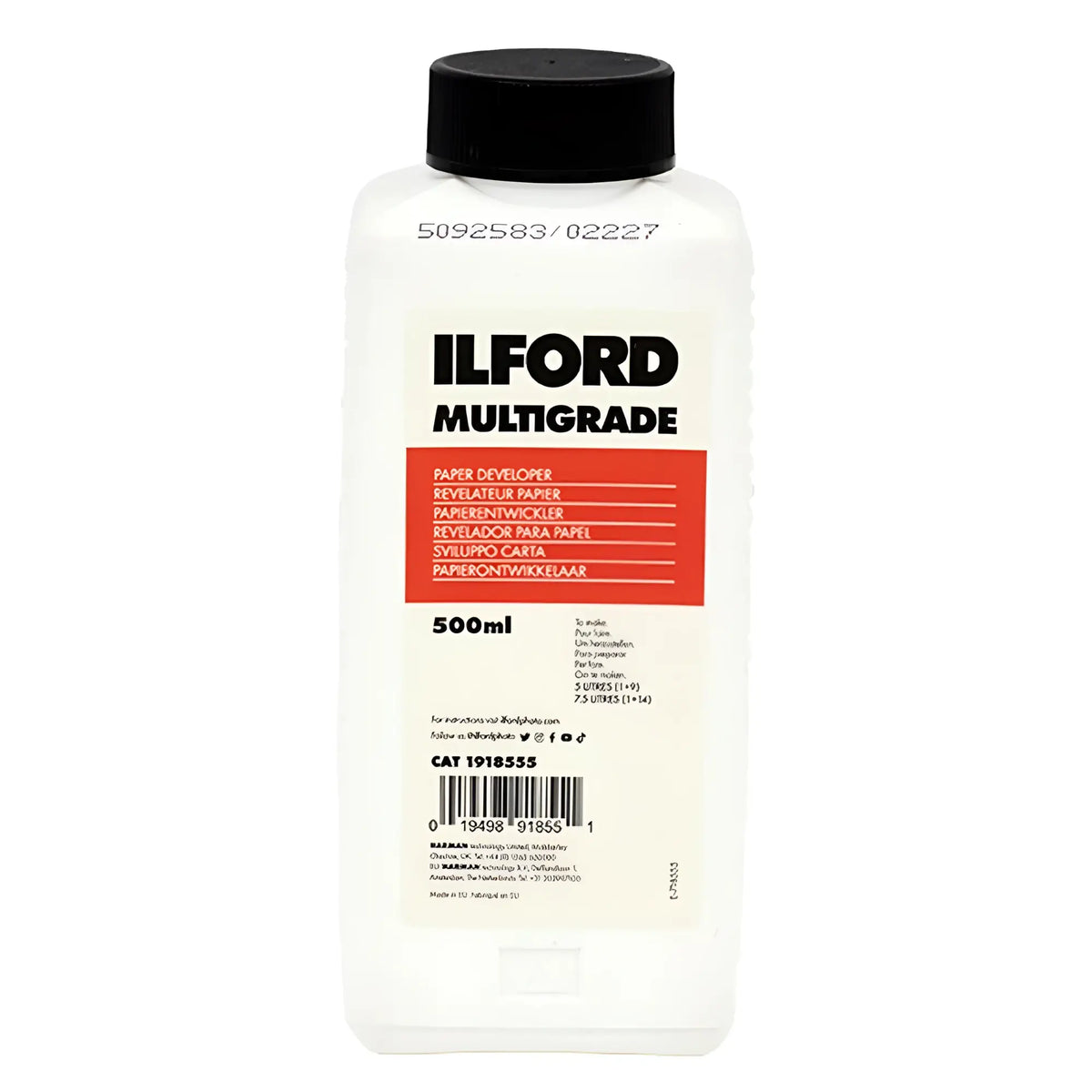 A clear plastic bottle with a black cap, labeled ’ilford multigrade’ in bold black text on a white label featuring an orange rectangular section.