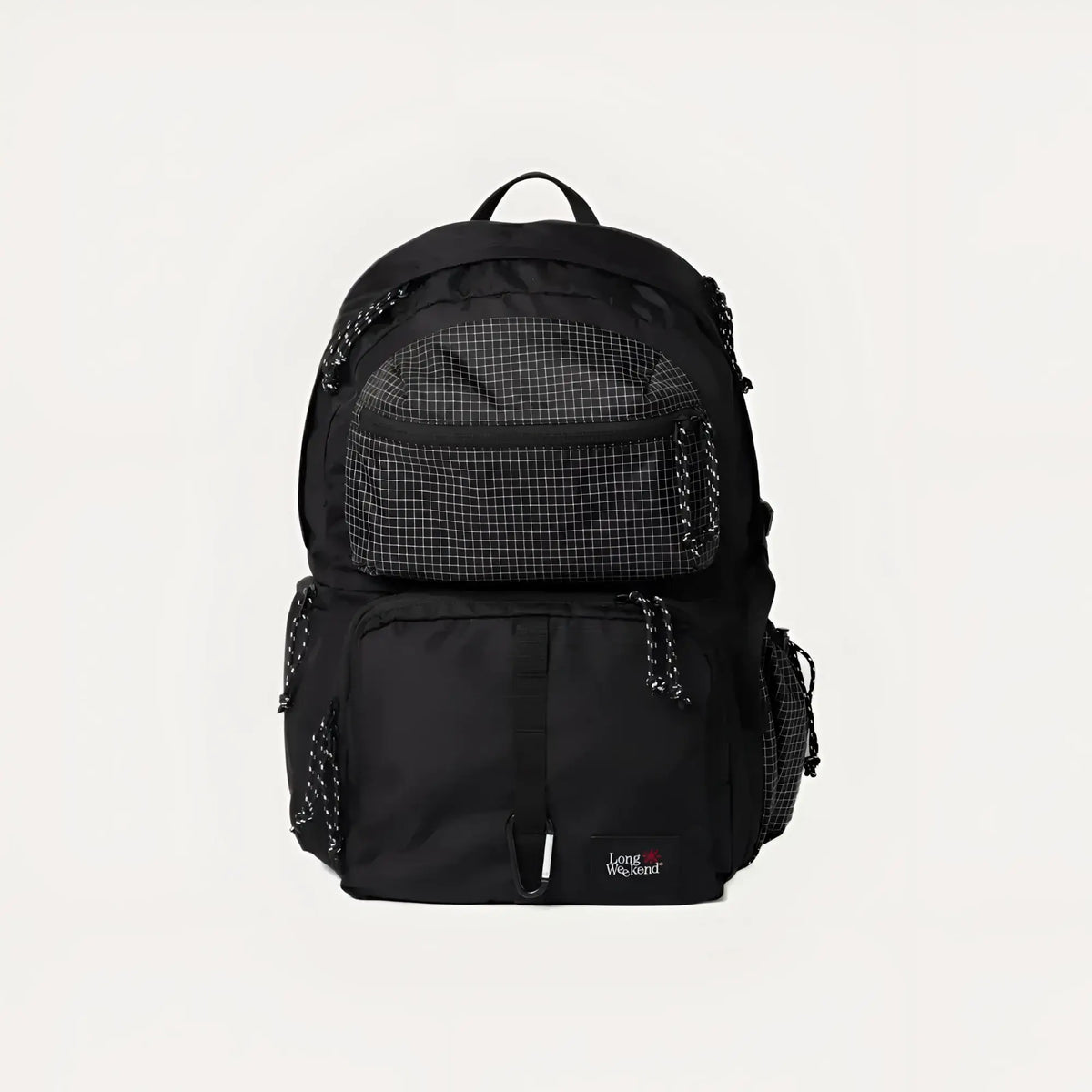 Black backpack with a grid-patterned front pocket and textured side panels, featuring the ’long weekend’ brand logo on its lower right corner.