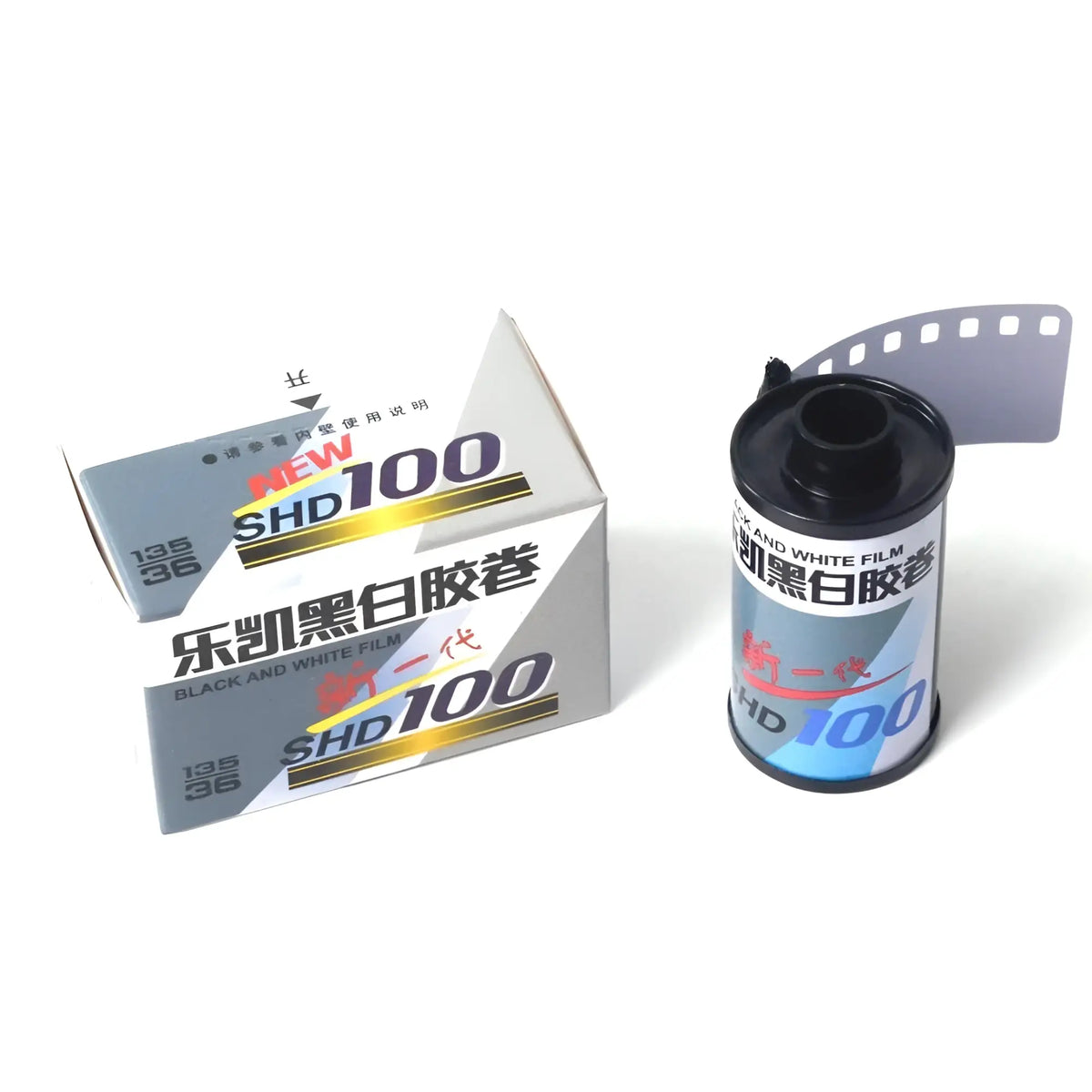 A roll of black and white film labeled ’shd100’’ with a silver and blue design, housed in its original packaging.