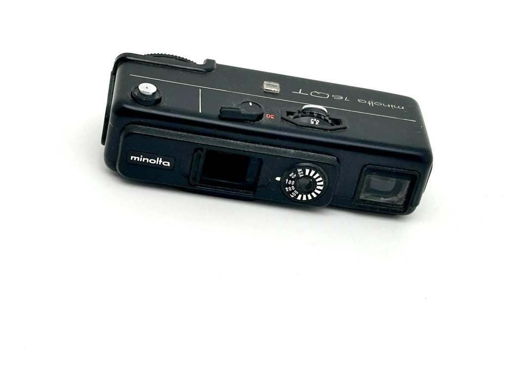 Black minolta 160t compact film camera with a matte finish and silver branding.