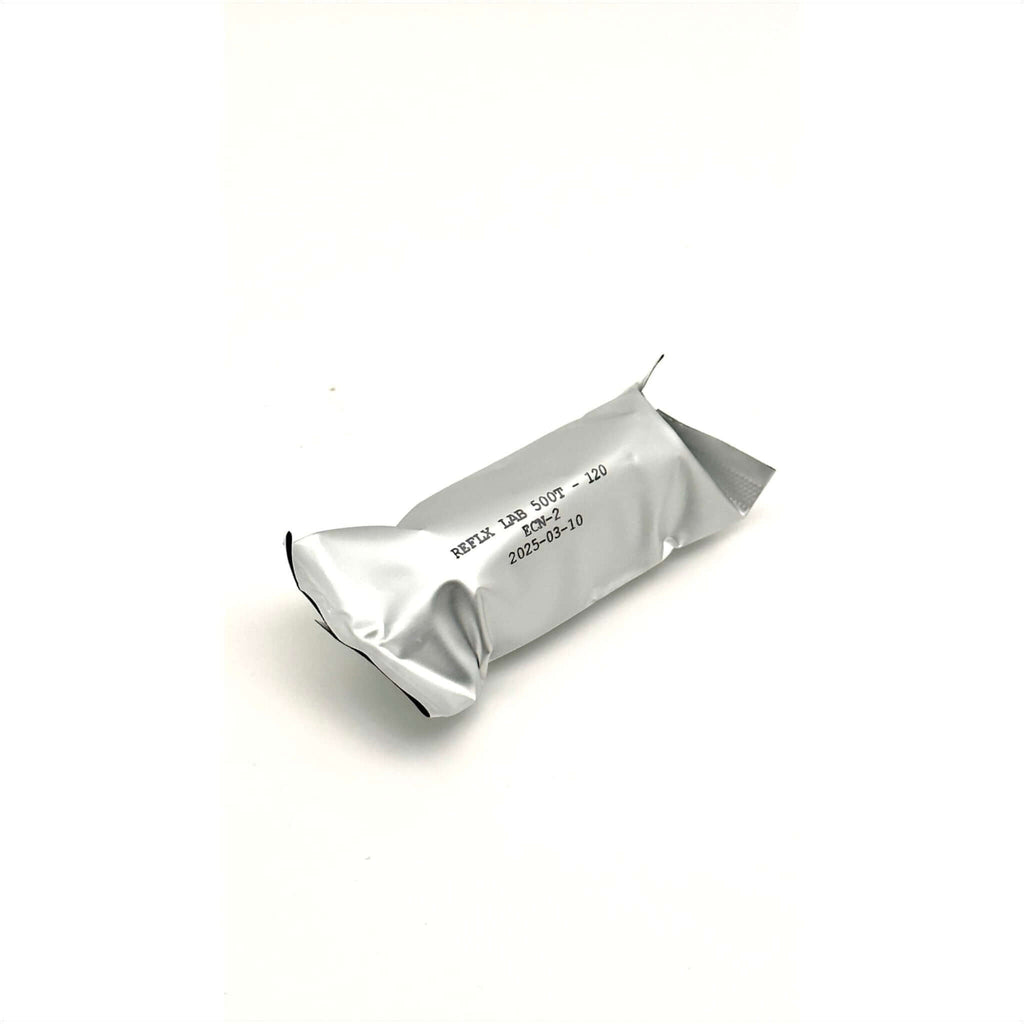 Reflx Lab 500T Color Ecn-2 120 film roll in silver packaging for medium format photography.