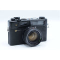 Yashica film camera with lens, featured in evaluation and testing services for film photography.